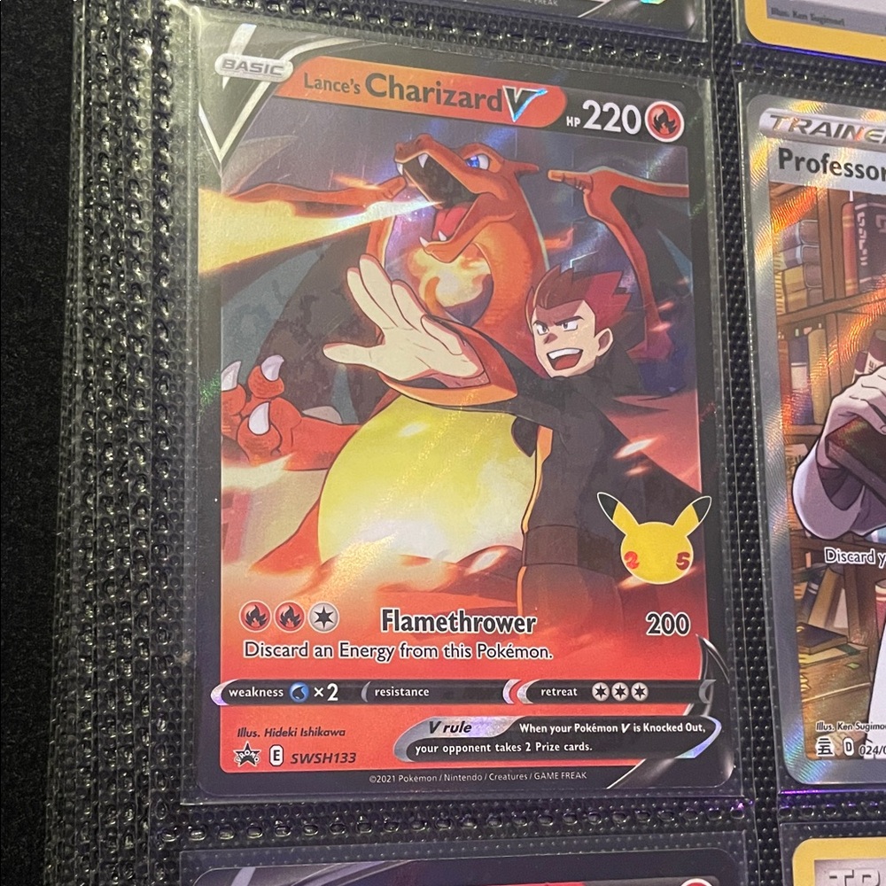 Pokemon Lance's Charizard V Trading Card - Red and Yellow